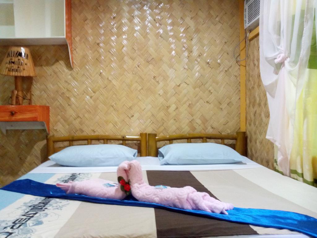 Chariz Inn El Nido Habitación foto