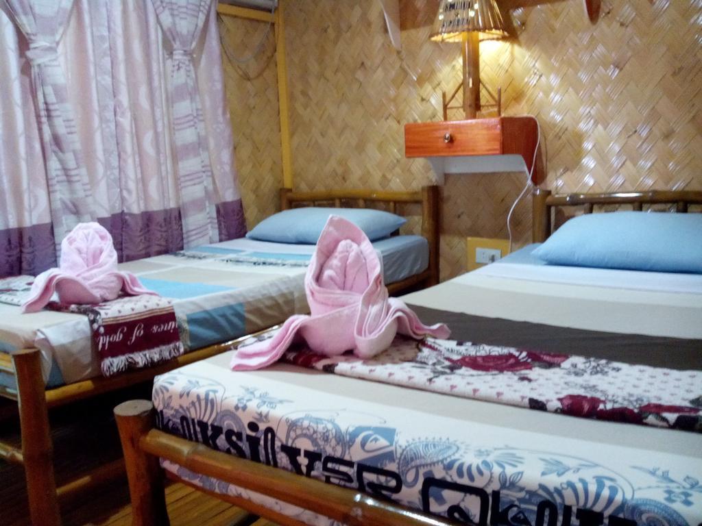 Chariz Inn El Nido Habitación foto